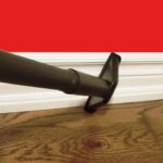 Cleaning Baseboard using Vacuum