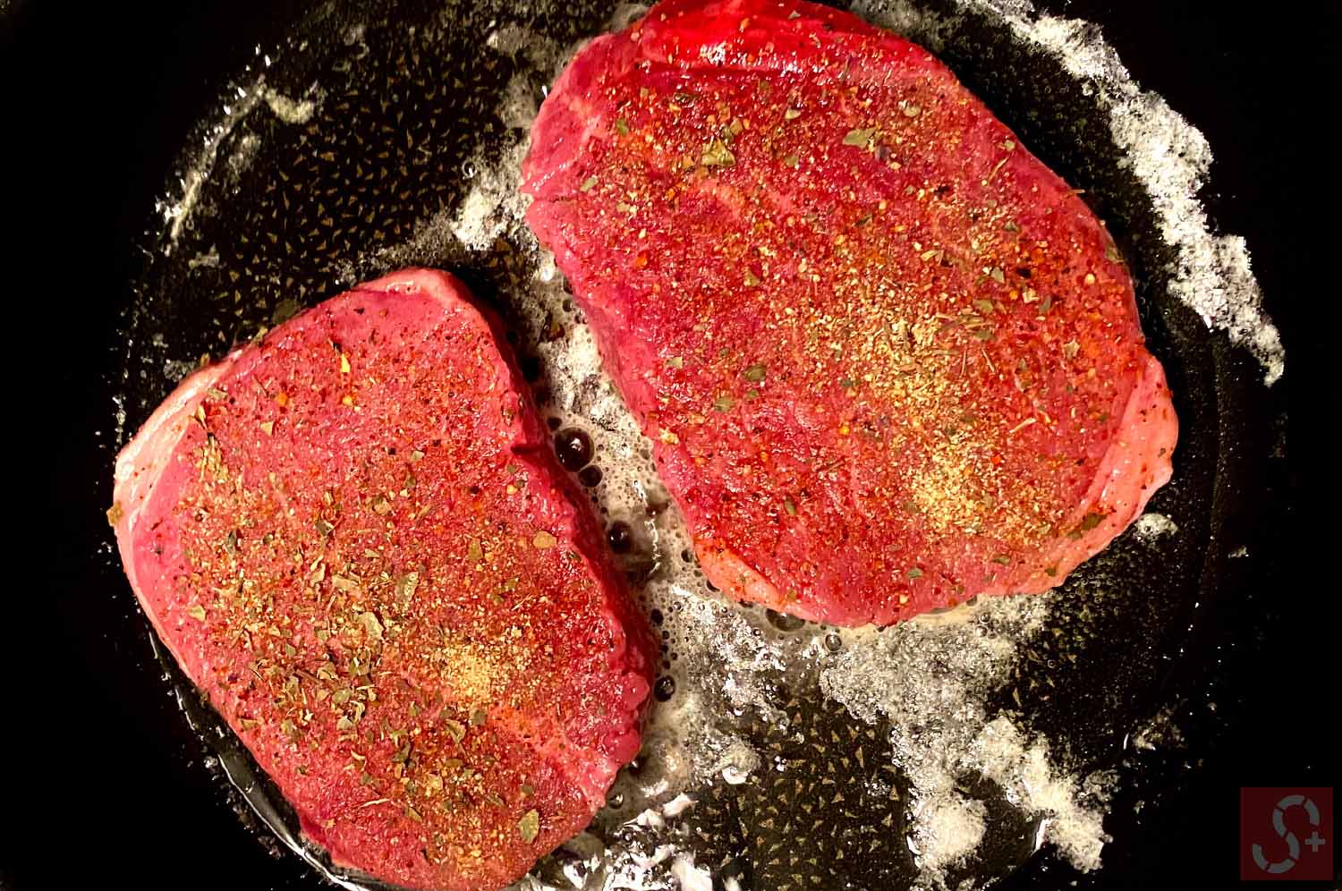 Two Steaks cooking at once