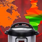 Instant Pot in front of map showing America to India
