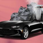 Garbage inside a Car in front of pink background