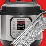 Instant Pot with Aluminum Foil in front of red background